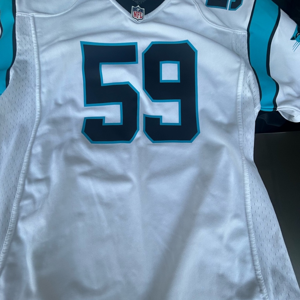 Carolina Panthers Luke Kuechly on field jersey